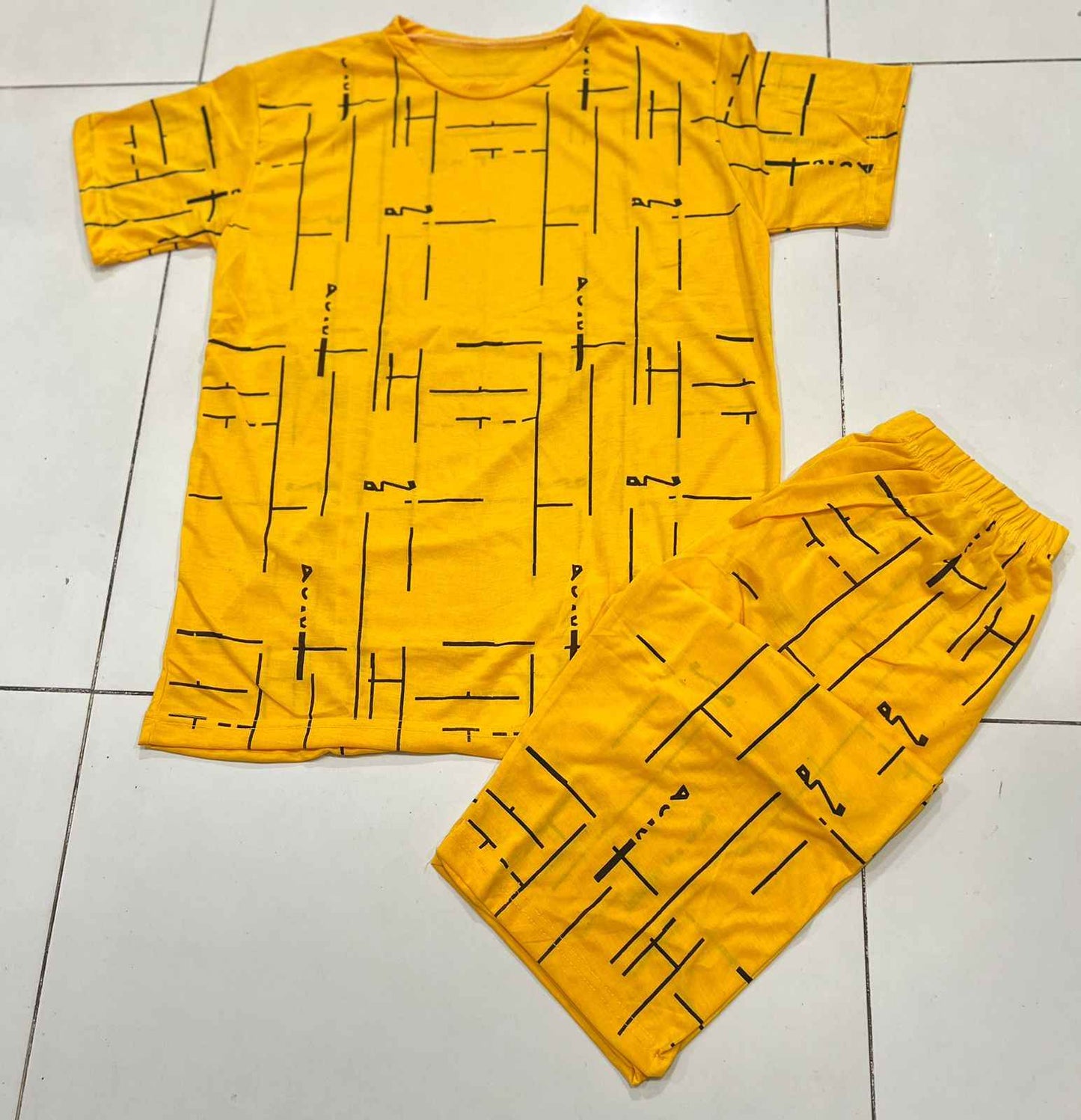 Chic Mustard Two-Piece Ensemble with Abstract Patterns