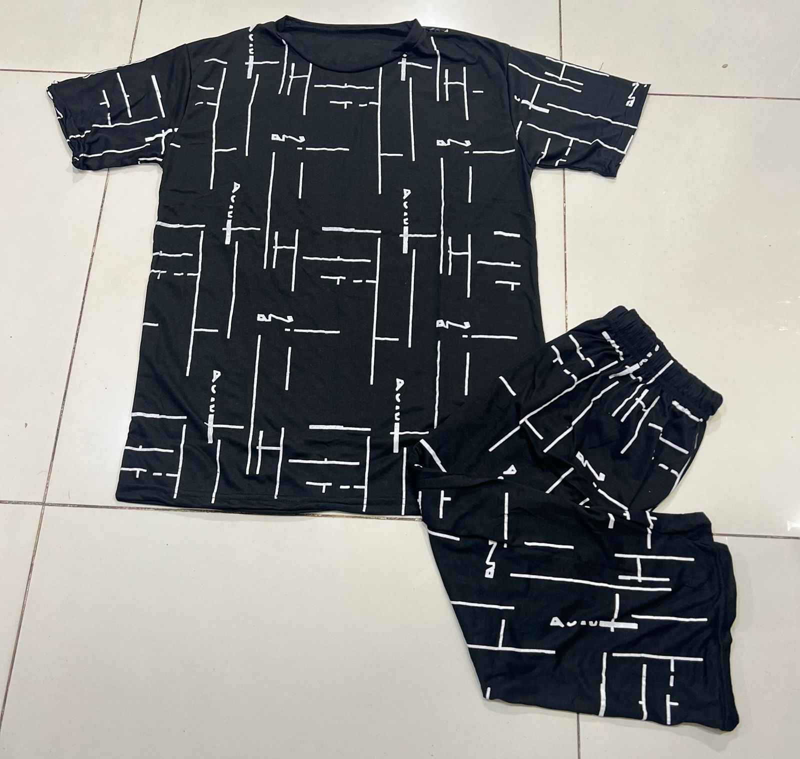 Elegant Black Two-Piece Set with Abstract White Patterns